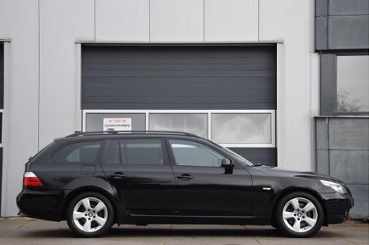 BMW 5-serie Touring - 525xi Business Line / Navigatie / Leer / Sportstoelen / Xenon / Stoelverwarmin - 1