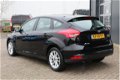 Ford Focus - 1.0 (101pk) Navi/ Airco/ Cruise/ Elek. pakket/ Isofix/ Bluetooth/ Armsteun/ Multi. Stuu - 1 - Thumbnail