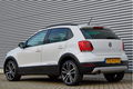 Volkswagen Polo - 1.2 Tsi 90pk Cross, Cruise control, Verw. voorstoelen, Airco, PDC achter - 1 - Thumbnail