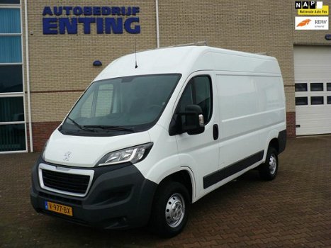 Peugeot Boxer - 335 2.0 BlueHDI L2H2 Pro trekhaak / geveerde stoel / laadvloer / 131 PK - 1