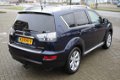 Mitsubishi Outlander - 2.4 AUTOM 4WD INSTYLE LEER SCHUIFDAK XENON 7-PERS 159000KM - 1 - Thumbnail