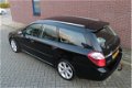 Subaru Legacy Touring Wagon - 2.0R Comfort - 1 - Thumbnail