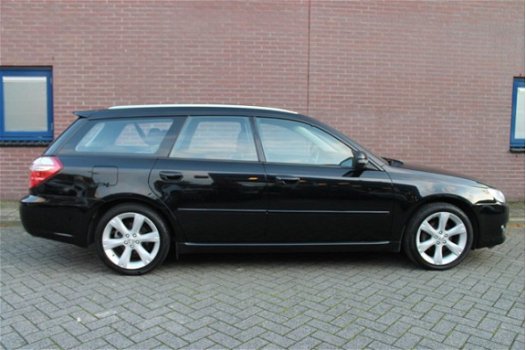 Subaru Legacy Touring Wagon - 2.0R Comfort - 1