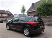 Peugeot 207 SW - 1.4 VTi X-line 95 Pk 5 deurs Airco 161 dkm Nap - 1 - Thumbnail