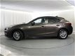 Mazda 3 - 3 1.5 TS+ / 96.000km / Dealeronderhouden / 5-drs / Navigatie / Climate&Cruise Control / - 1 - Thumbnail