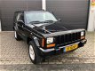 Jeep Cherokee - 4.0i Limited automaat - 1 - Thumbnail