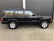 Jeep Cherokee - 4.0i Limited automaat - 1 - Thumbnail