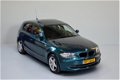 BMW 1-serie - 118d Automaat Facelift/Navigatie/PDC/Schuifdak - 1 - Thumbnail