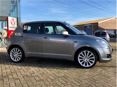 Suzuki Swift - 1.5 Exclusive. 17" LM wielen, navi, airco. 107.000 km NAP