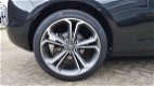 Opel Astra GTC - 1.4 Turbo Sport - Airco ecc- Leer/stoelverwarming - Cruise - Navi - 20inch L.m velg - 1 - Thumbnail