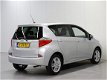 Toyota Verso S - 1.3 VVT-i Dynamic | Navigatie | Cruise control | Panoramadak - 1 - Thumbnail