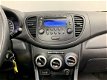 Hyundai i10 - 1.2 Plus 5-drs Airco NL Auto - 1 - Thumbnail