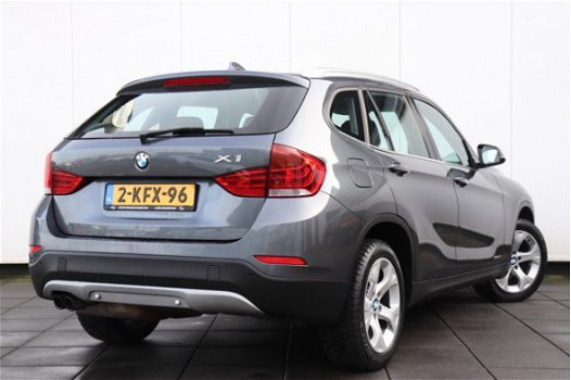 BMW X1 - sDrive20i Chrome Line | 184 PK | AUTOMAAT | NAVI | CRUISE | CLIMATE | LMV | XENON | DEALER - 1