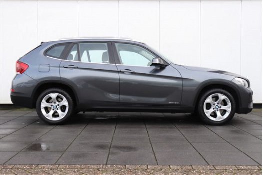 BMW X1 - sDrive20i Chrome Line | 184 PK | AUTOMAAT | NAVI | CRUISE | CLIMATE | LMV | XENON | DEALER - 1