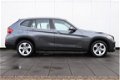 BMW X1 - sDrive20i Chrome Line | 184 PK | AUTOMAAT | NAVI | CRUISE | CLIMATE | LMV | XENON | DEALER - 1 - Thumbnail