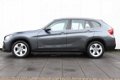 BMW X1 - sDrive20i Chrome Line | 184 PK | AUTOMAAT | NAVI | CRUISE | CLIMATE | LMV | XENON | DEALER - 1 - Thumbnail