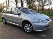 Peugeot 307 SW - 2.0 16V Premium 2005/PANO/CLIMA/AUTOMAAT/PDC/ - 1 - Thumbnail