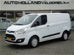 Ford Transit Custom - 2.2 TDCI 74KW 101PK TREND AIRCO/ CRUISE CONTROL/ BIJRIJDERSBANK/ - 1 - Thumbnail