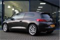 Volkswagen Scirocco - 2.0TFSI 200PK Highline | ORG. NL | SUPER STAAT | STOELVERW. | CLIMATE CONTROL - 1 - Thumbnail