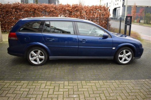 Opel Vectra Wagon - 2.2-16V V-Line - 1