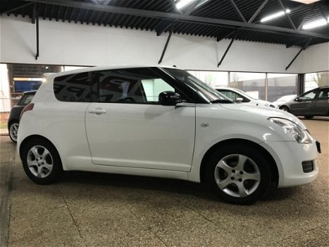 Suzuki Swift - 1.3 Comfort Airco/lmv/140233km - 1