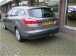 Ford Focus Wagon - 1.0 ECOB.125 PK TITANIUM WAGON/TREKHAAK - 1 - Thumbnail