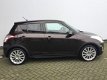 Suzuki Swift - 1.2 Exclusive Automaat * ex 1e gebruiker + zomer- en winterset - 1 - Thumbnail