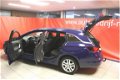 Opel Astra Sports Tourer - 1.4 Business+ 150pk 1400KG GEREMD - 1 - Thumbnail