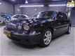 Jaguar X-type - 2.0 D Executive /Leder/Navi/Apk 11-2020/Cruise & Climate Control/Alarm/Stoel. elec - 1 - Thumbnail