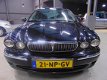 Jaguar X-type - 2.0 D Executive /Leder/Navi/Apk 11-2020/Cruise & Climate Control/Alarm/Stoel. elec - 1 - Thumbnail