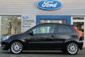 Ford Fiesta - 1.6i 100PK 3DR RALLY EDITION | LAGE KM-STAND | VOL OPTIES | AIRCO | SPOILER | VOORRUIT - 1 - Thumbnail