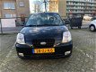 Kia Picanto - 1.1 LXE AIRCO STUURBEKRACHTING - 1 - Thumbnail