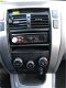 Hyundai Tucson - 2.0i Dynamic airco, Dealerauto met boekjes - 1 - Thumbnail