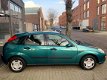 Ford Focus - 1.4-16V Trend NAP APK t/m 06/2020 - 1 - Thumbnail