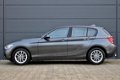 BMW 1-serie - 116i Business+ Sport (NAVIGATIE, SPORTSTOELEN, XENON, BLUETOOTH, DEALER ONDERHOUDEN, C - 1 - Thumbnail