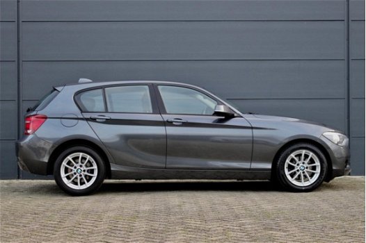 BMW 1-serie - 116i Business+ Sport (NAVIGATIE, SPORTSTOELEN, XENON, BLUETOOTH, DEALER ONDERHOUDEN, C - 1
