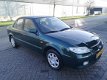 Mazda 323 - 1.6i Touring Airco , nieuwe APK , NAP , Inruil mogelijk - 1 - Thumbnail