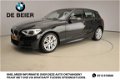BMW 1-serie - 118D M-sportpakket / Xenon / Navigatie / Sportstoelen / Stoelverwarming / Sportonderst - 1 - Thumbnail