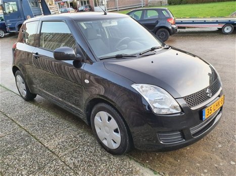 Suzuki Swift - 1.3 Cool - 1