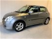 Suzuki Swift - 1.5 Exclusive Airco Keyless go Trekhaak - 1 - Thumbnail