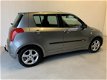 Suzuki Swift - 1.5 Exclusive Airco Keyless go Trekhaak - 1 - Thumbnail