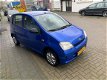 Daihatsu Cuore - 1.0-12V DVVT STi 5-deurs met een nieuwe APK - 1 - Thumbnail