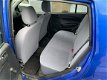 Daihatsu Cuore - 1.0-12V DVVT STi 5-deurs met een nieuwe APK - 1 - Thumbnail