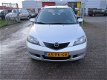 Mazda 2 - 2 1.4 Exclusive Airco/Dealer onderhouden - 1 - Thumbnail