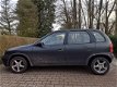 Opel Corsa - 1.2iE GLS | Stuurbekrachtiging - 1 - Thumbnail