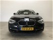 BMW 1-serie - 116i Sport 5-Drs. NAVI/XENON/LEER SPORTSTOELEN/16INCH/PDC - 1 - Thumbnail