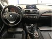 BMW 1-serie - 116i Sport 5-Drs. NAVI/XENON/LEER SPORTSTOELEN/16INCH/PDC - 1 - Thumbnail