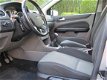 Ford Focus - 1.6 Comfort 5DRS/CLIMAAT/CRUISE-CONTROL/LM/110.681KM - 1 - Thumbnail