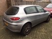 Alfa Romeo 147 - 1.6 T.Spark Distinctive -loopt soms op 3 cilinders-inruilkoopje - 1 - Thumbnail