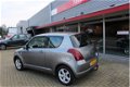 Suzuki Swift - 1.3 Exclusive zeer mooi airco keyless go - 1 - Thumbnail